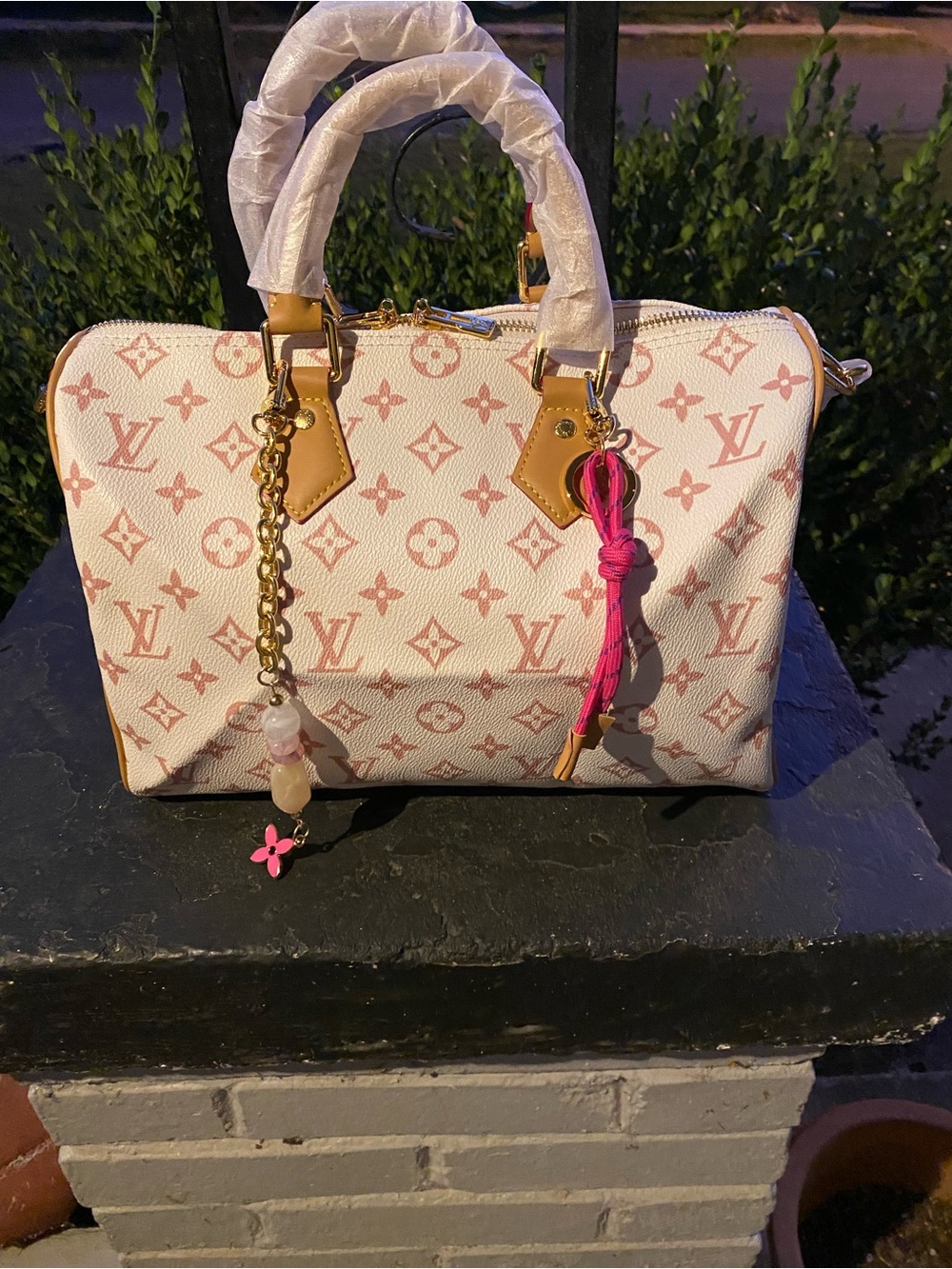Not Authentic Louis Vuitton White and Pink Monogram Satchel with Gold Hardware